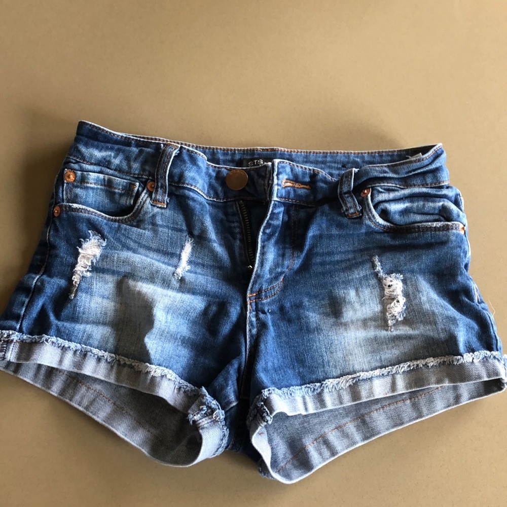 Dark wash distressed jean shorts, size 00
